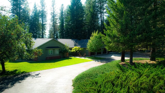 view of front of home with a front yard