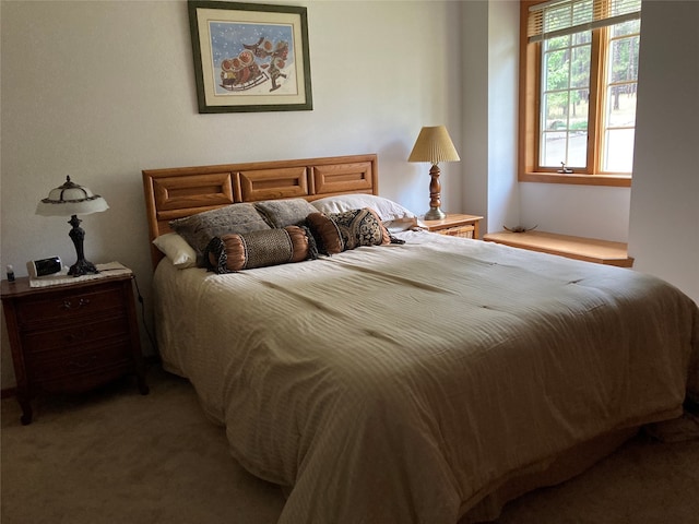 bedroom featuring carpet