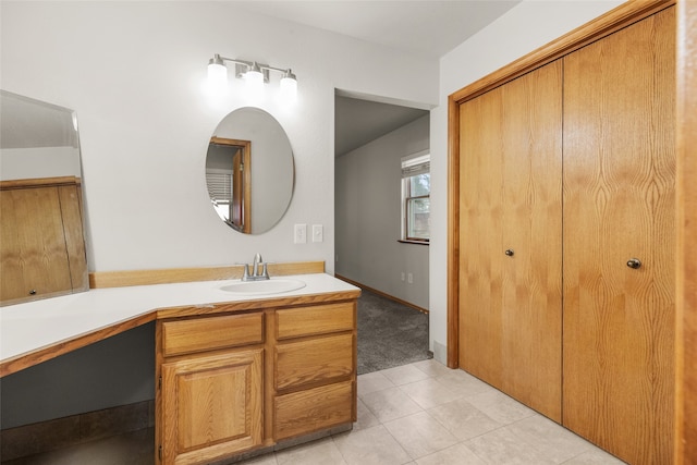 bathroom featuring tile patterned floors and vanity