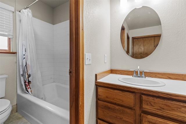 full bathroom featuring tile patterned flooring, shower / tub combo with curtain, vanity, and toilet