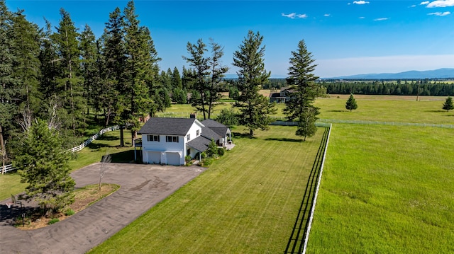 bird's eye view featuring a mountain view and a rural view