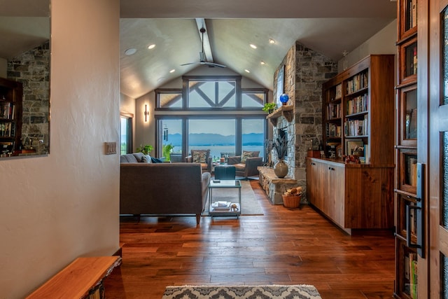 living area with recessed lighting, high vaulted ceiling, a ceiling fan, and hardwood / wood-style flooring