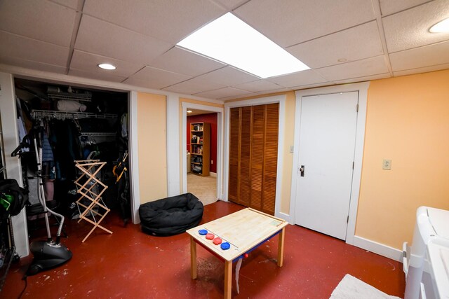 basement featuring a drop ceiling