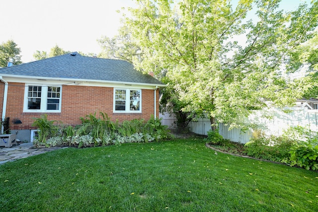 exterior space with a lawn