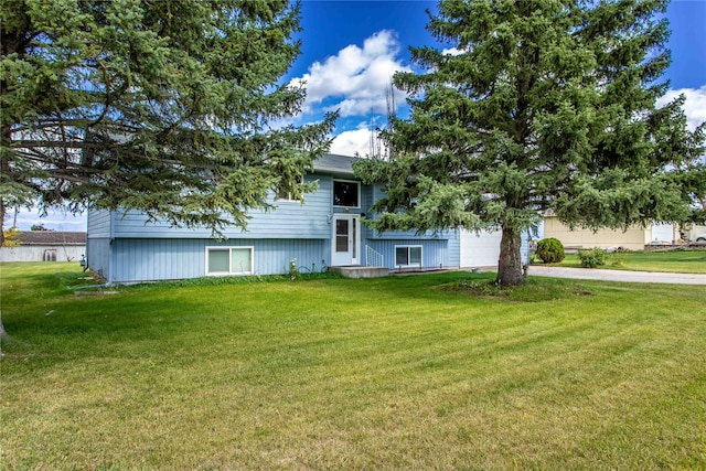 view of front of home with a front lawn