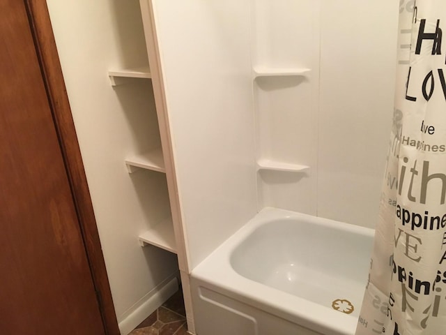 106 State St, Hamilton, MT 59840 - full bathroom featuring tile patterned flooring and shower / tub combo with curtain