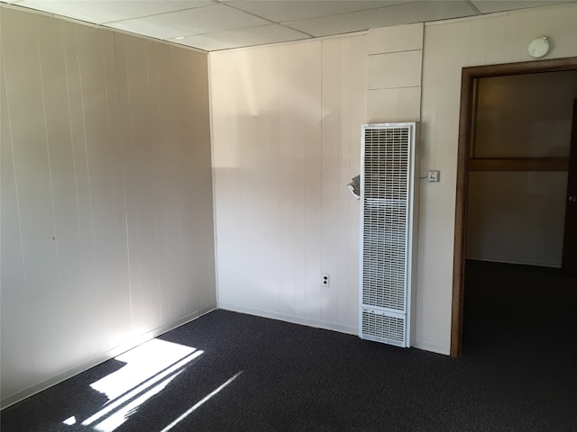 106 State St, Hamilton, MT 59840 - unfurnished room with a heating unit, dark carpet, and a smoke detector