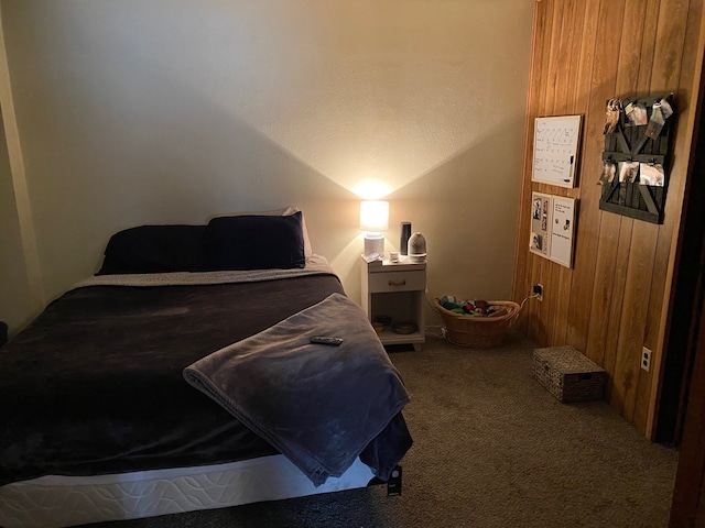 106 State St, Hamilton, MT 59840 - carpeted bedroom featuring wood walls
