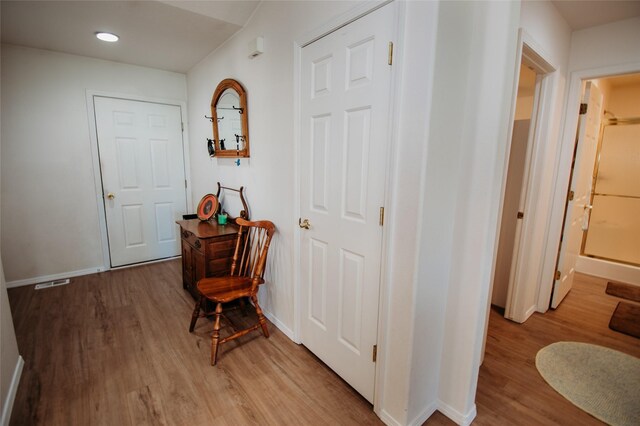 hall featuring light hardwood / wood-style flooring