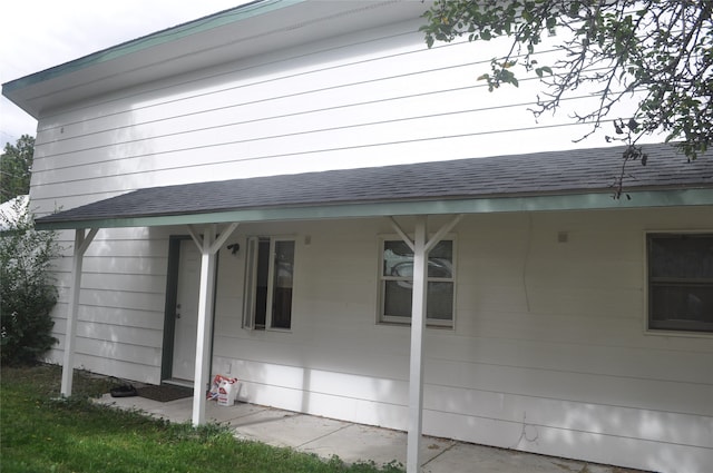 view of home's exterior featuring covered porch