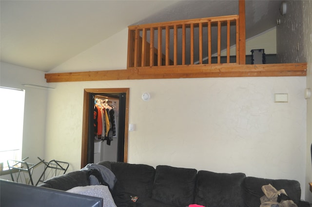 living room with lofted ceiling