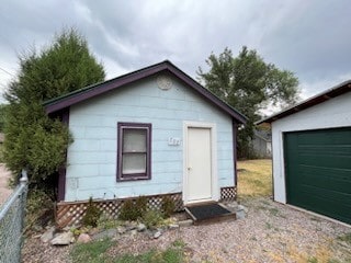 view of outdoor structure with a garage