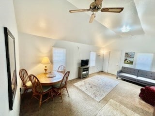 interior space featuring vaulted ceiling and ceiling fan