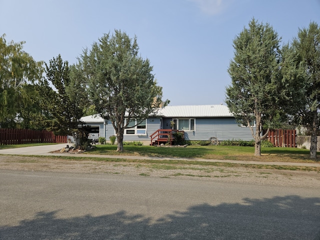 214 Laura St, Augusta, MT 59410 - view of front of property featuring a metal roof and driveway