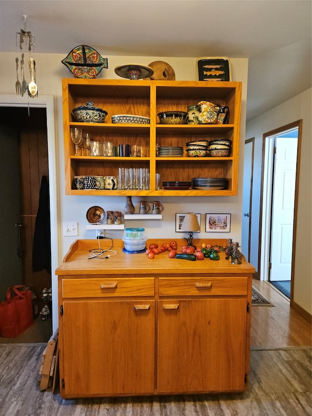 kitchen featuring wooden counters and wood-type flooring