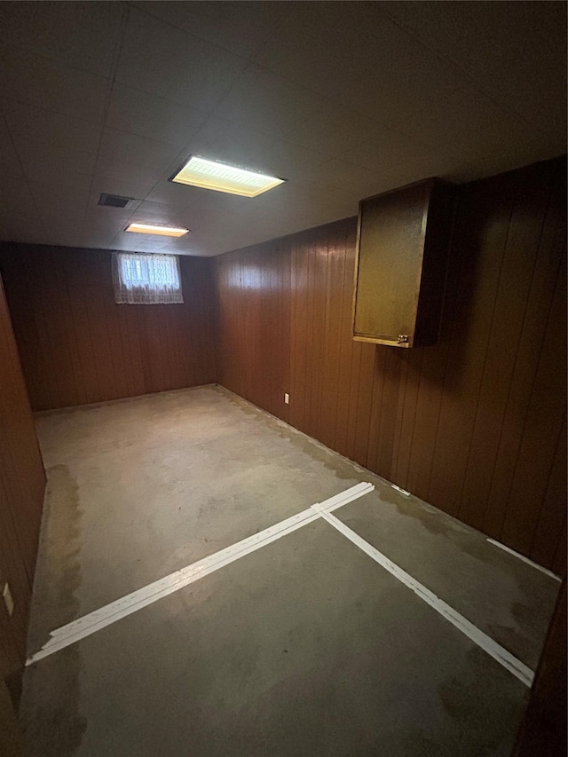 214 Laura St, Augusta, MT 59410 - basement with wooden walls and carpet flooring