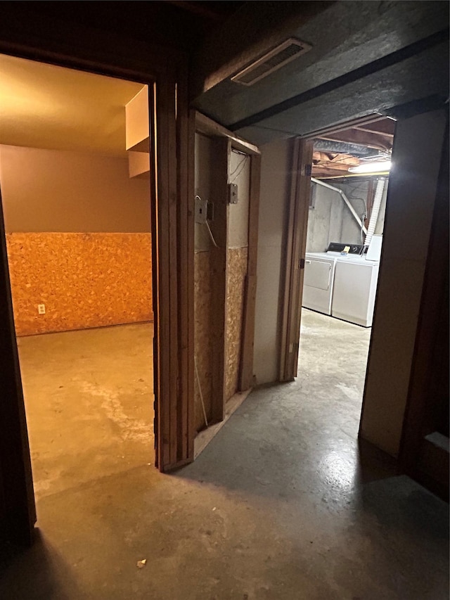 214 Laura St, Augusta, MT 59410 - corridor with concrete floors and washer and dryer