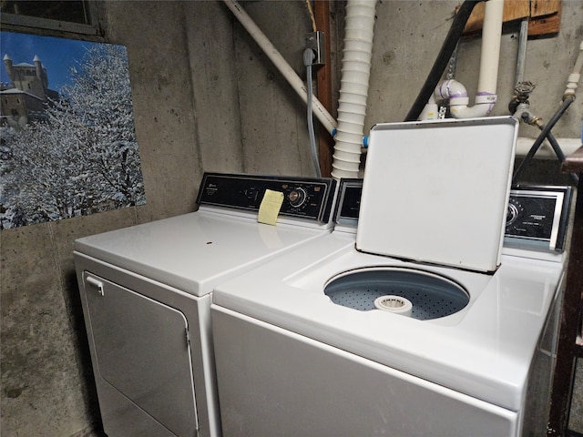 laundry room featuring separate washer and dryer