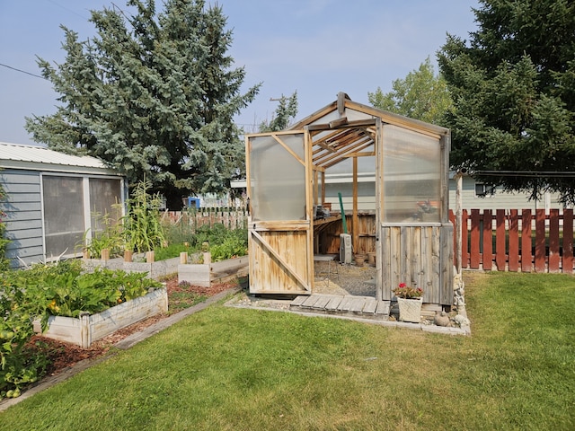 view of outbuilding with a lawn