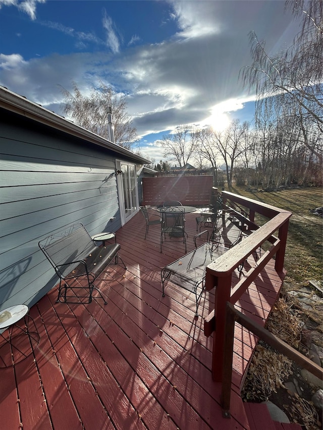 214 Laura St, Augusta, MT 59410 - wooden terrace with outdoor dining space