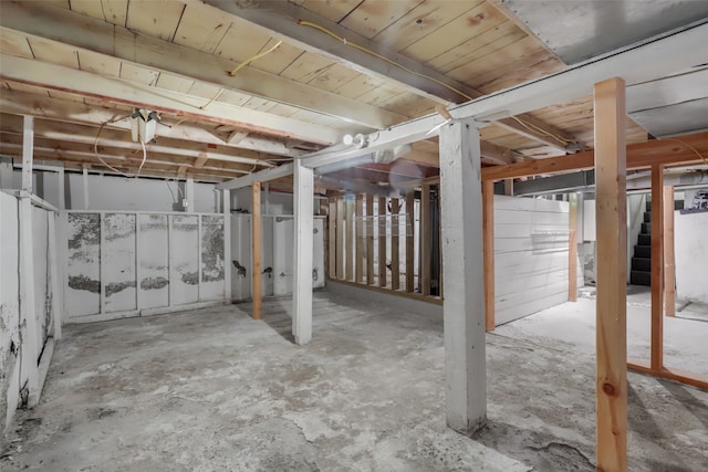 basement featuring wood ceiling