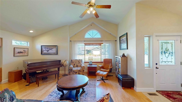 sitting room featuring lofted ceiling, light hardwood / wood-style floors, and ceiling fan