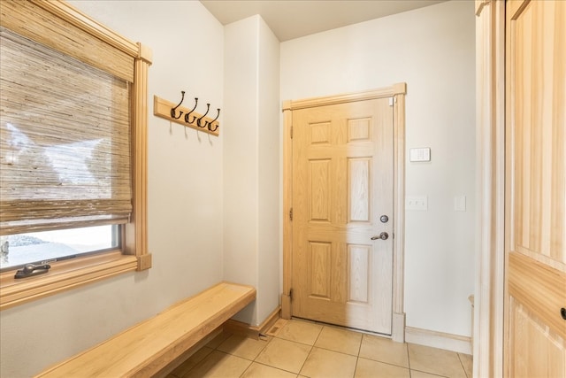 mudroom with light tile patterned floors