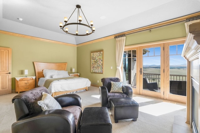 carpeted bedroom with crown molding, access to outside, a notable chandelier, and a water view