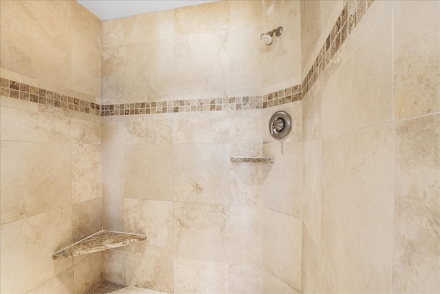 details with a tile shower