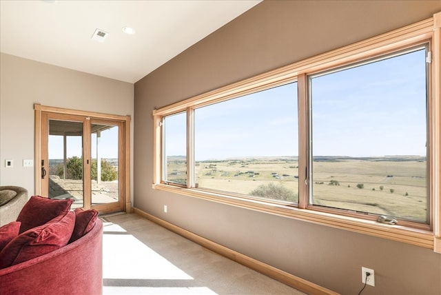 sunroom with a rural view