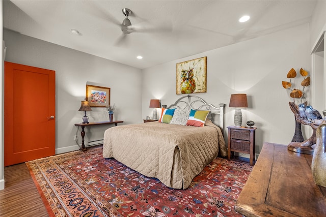 bedroom featuring ceiling fan and wood-type flooring