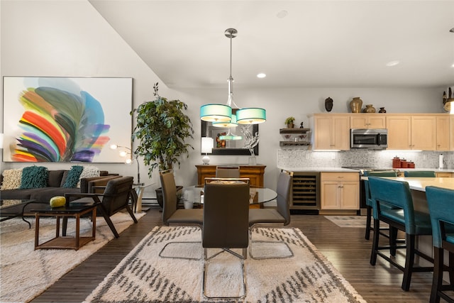 dining room with wine cooler and dark hardwood / wood-style floors