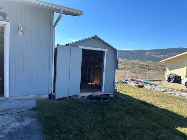 view of outdoor structure with a yard