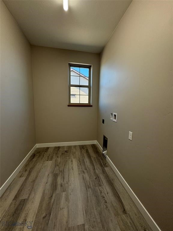 laundry room featuring washer hookup, hardwood / wood-style floors, and electric dryer hookup