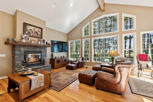 living room with high vaulted ceiling, a fireplace, beamed ceiling, and hardwood / wood-style flooring