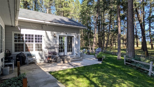 view of yard with entry steps and a patio area