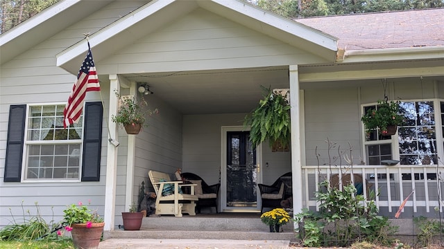 entrance to property with a porch