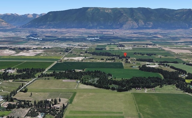 bird's eye view featuring a mountain view and a rural view