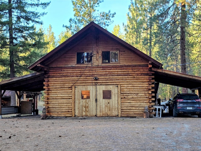 exterior space featuring a carport