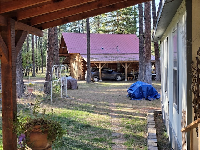 view of yard featuring a carport