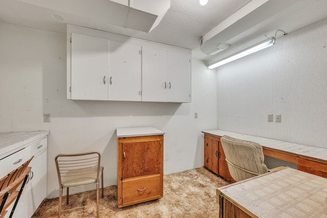 office space with a textured ceiling