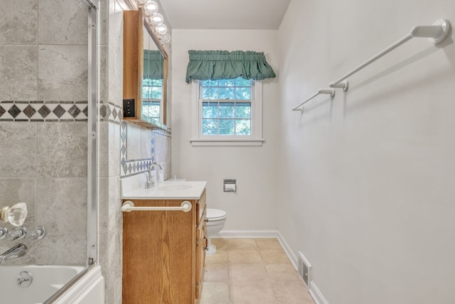 full bath with vanity, toilet, baseboards, bath / shower combo with glass door, and visible vents