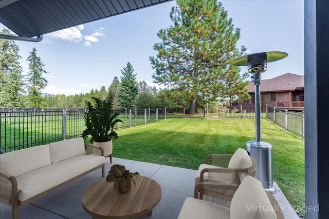 view of patio featuring a fenced backyard and an outdoor hangout area