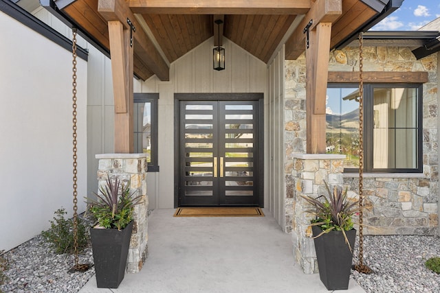 view of exterior entry featuring french doors