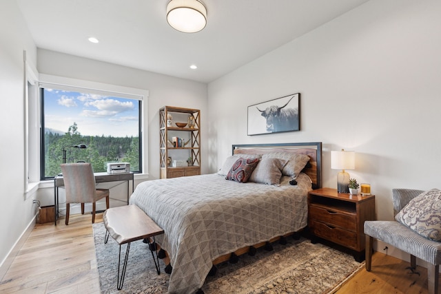 bedroom with light wood-type flooring