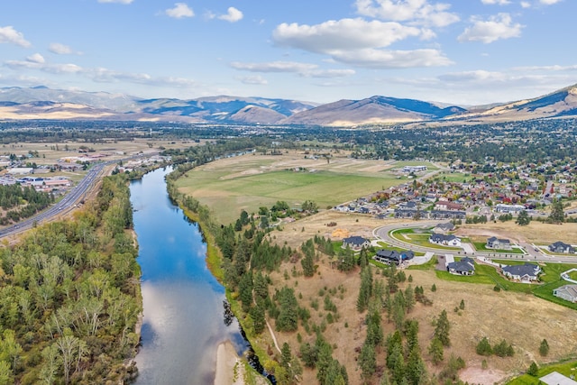 bird's eye view featuring a water and mountain view