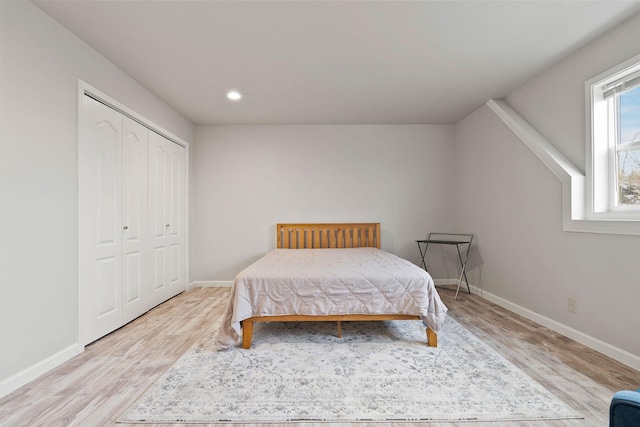 880 Farm Rd, Kalispell, MT 59901 - bedroom featuring light hardwood / wood-style floors and a closet