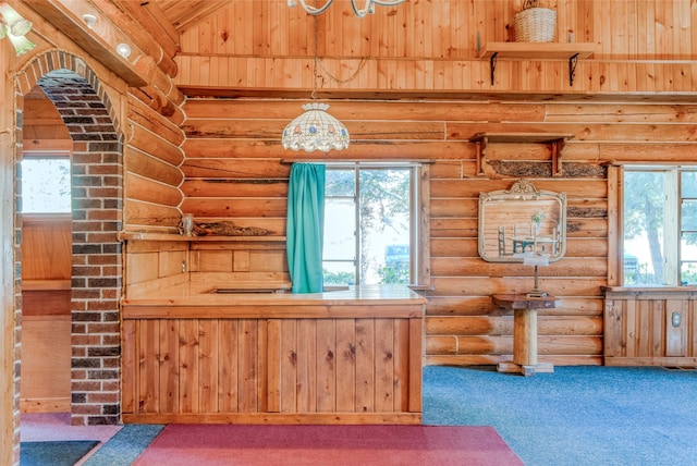 2237 Grave Creek Rd, Eureka, MT 59917 - kitchen featuring carpet floors and log walls