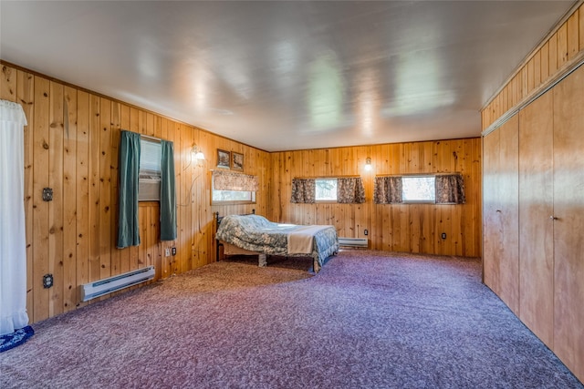 2237 Grave Creek Rd, Eureka, MT 59917 - carpeted bedroom featuring a baseboard radiator and wooden walls
