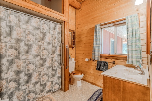 2237 Grave Creek Rd, Eureka, MT 59917 - full bath with wood walls, vanity, a shower with shower curtain, and tile patterned flooring